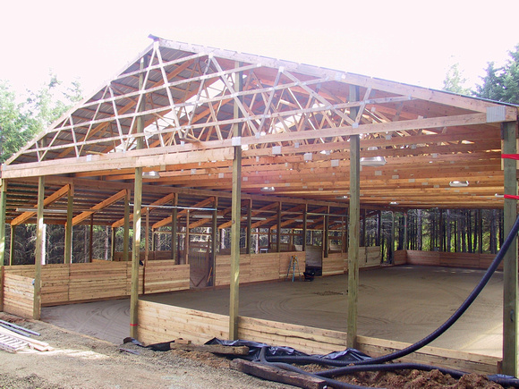 60 x 135 riding arena showing side rooms and stalls